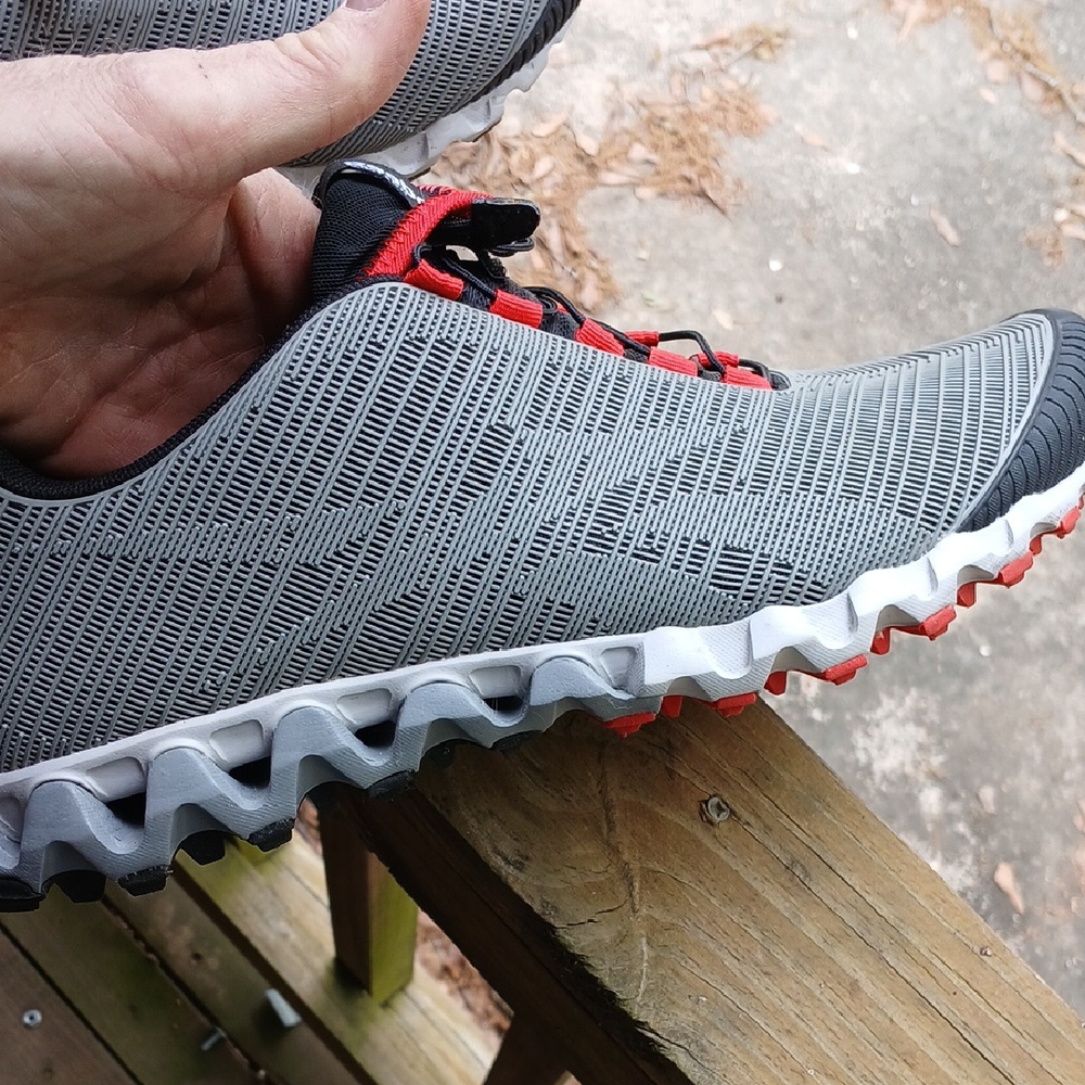 Gray and Red Athletic Shoes